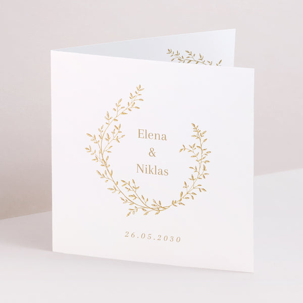 Hochzeitseinladung Doppelflügelfenster goldener Blumenkranz foto
